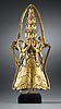 A very rare gilt bronze figure of the eleven-headed Avalokiteshvara Ekadasa